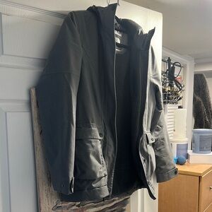 The North Face Gray Performance Jacket for Versatile Outdoor Use